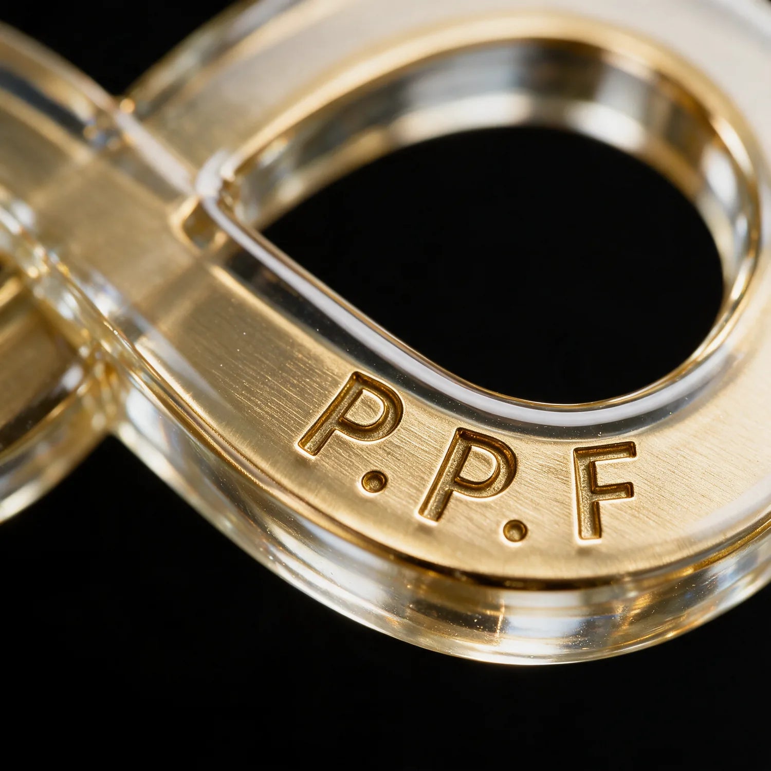 The engraved P.P.F signature, macro detail
